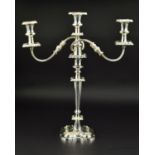 AN ELIZABETH II SILVER THREE LIGHT CANDELABRUM OF VICTORIAN STYLE, shaped square detachable sconces,