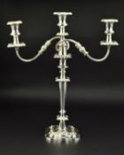 AN ELIZABETH II SILVER THREE LIGHT CANDELABRUM OF VICTORIAN STYLE, shaped square detachable sconces,