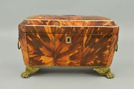 AN EARLY 19TH CENTURY TORTOISESHELL TEA CADDY, of sarcophagus form, horn, ivory and pewter