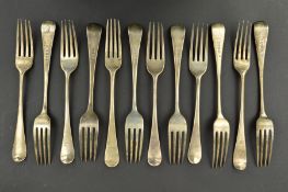 A MATCHED SET OF SIX HANOVERIAN PATTERN TABLE FORKS, all engraved with a crest, maker George