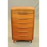 WHITE & NEWTON, PORTSMOUTH, a tall teak chest of seven long drawers with the top drawer reed