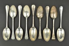 NINE GEORGE I/II SILVER HANOVERIAN PATTERN TABLESPOONS, including a set of four with engraved