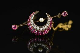A VICTORIAN GOLD RUBY, PEARL AND DIAMOND CRESCENT BAR BROOCH, crescent comprised of graduated oval