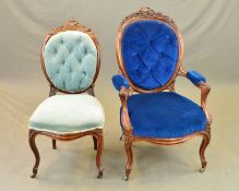 A VICTORIAN ROSEWOOD ELBOW SALON CHAIR, the shaped oval buttoned back surmounted by a carved central