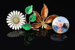 FOUR SCANDINAVIAN DESIGNER ENAMEL BROOCHES, the first designed as a brown enamel maple leaf by Hroar