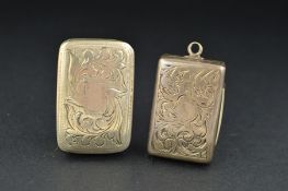 A GEORGE IV SILVER VINAIGRETTE, of rectangular form, the hinged cover engraved with foliate