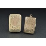 A GEORGE IV SILVER VINAIGRETTE, of rectangular form, the hinged cover engraved with foliate