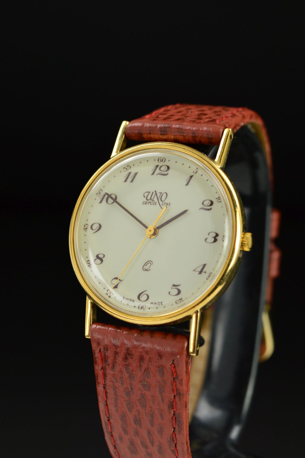A MID TO LATE 20TH CENTURY 9CT GOLD GENT'S UNO WRISTWATCH, cream dial with Arabic numerals, Quartz - Image 4 of 10