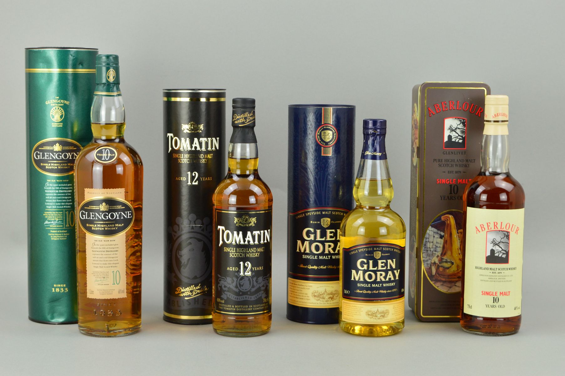FOUR BOTTLES OF SINGLE MALT, comprising a bottle of Glengoyne Single Highland Malt Scotch Whisky,