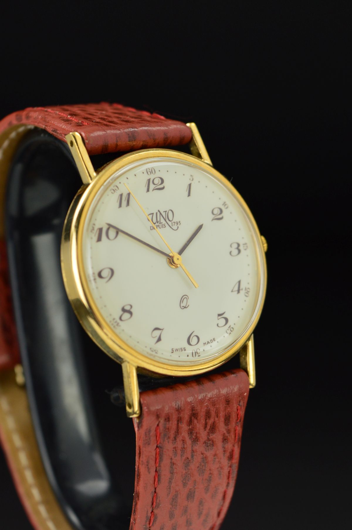 A MID TO LATE 20TH CENTURY 9CT GOLD GENT'S UNO WRISTWATCH, cream dial with Arabic numerals, Quartz - Image 5 of 10