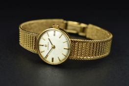 A MID TO LATE 20TH CENTURY 9CT GOLD LADIES OMEGA WRISTWATCH, round dial measuring approximately 19mm