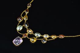 A MID 20TH CENTURY MULTI STONE FRINGE STYLE NECKLET, gemstones to include amethysts, garnets,