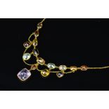 A MID 20TH CENTURY MULTI STONE FRINGE STYLE NECKLET, gemstones to include amethysts, garnets,