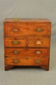 AN EARLY 19TH CENTURY MAHOGANY AND CAMPHORWOOD CAMPAIGN SECRETAIRE CHEST, ebony stringing, the