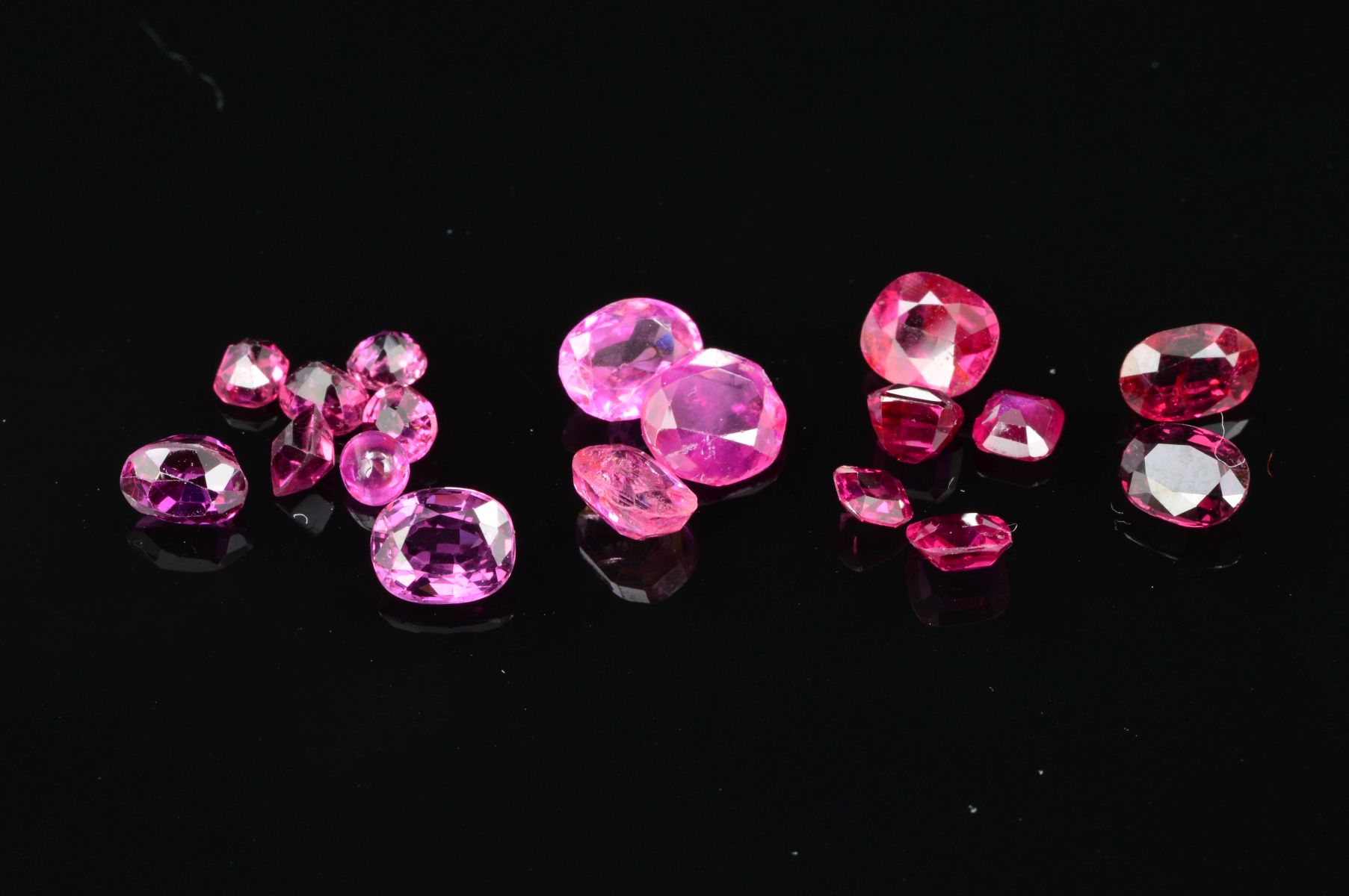 A SELECTION OF VARI-SHAPE RUBIES, approximate total weight 6.78ct, approximate size range from 0.