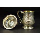 A GEORGE III SILVER MUG, of baluster form, gilt interior, 'S' scroll handle, cartouche engraved with