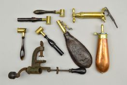 A GROUP OF ANTIQUE TOOLS, consisting of a 12 bore capper/decapper, three powder measures, a shot