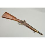 AN ANTIQUE 28 BORE 14 1/4'' BARREL PERCUSSION CARBINE, of native manufacture, the action is