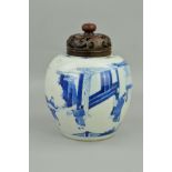 A CHINESE PORCELAIN BLUE AND WHITE DECORATED GLOBULAR JAR, with pierced hardwood cover, the jar