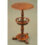 A VICTORIAN WALNUT WINE TABLE, the circular top on a baluster and turned pedestal with circular