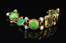 A VINTAGE MULTI GEM AND CARVED INTAGLIO PANEL LINK BRACELET, various gemstones and cuts and sizes,