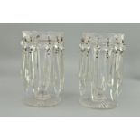 A PAIR OF VICTORIAN CLEAR GLASS LUSTRES, scalloped rims holding fourteen facet cut droppers,