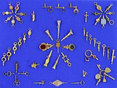 A 19TH CENTURY TO EARLY 20TH CENTURY LARGE DECORATIVE POCKET WATCH KEY COLLECTION, to include many