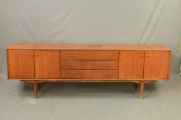 AN EVEREST 7FT TEAK SIDEBOARD, flanked by two double cupboard doors and three central drawers,