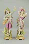 A PAIR OF ROYAL DUX FIGURES OF LADY AND GENTLEMAN MUSICIANS, dressed in 18th Century style