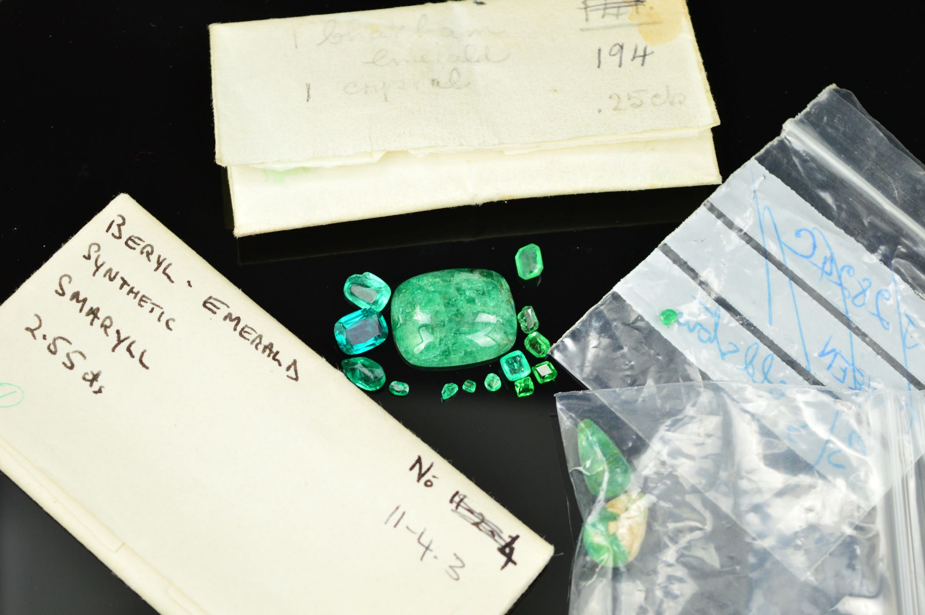 A COLLECTION OF MIXED GREEN GEMSTONES, vari-cut and size, to include emeralds, synthetic emerald, - Image 2 of 2