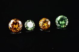 FOUR MODERN ROUND BRILLIANT COLOURED DIAMONDS, approximate total weight 1.33ct, two green and two