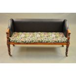 A VICTORIAN STAINED OAK AND PINE WINDOW SEAT, the short rectangular back and sloped arms with