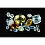 AN ASSORTED AQUAMARINE COLLECTION, to include a yellow beryl measuring approximately 12.0mm x 9.6mm,