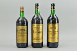 THREE MAGNUMS OF COTE DE BOURG WINE, comprising two bottles of Chateau Beauguerit 1983 and a