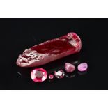A MISCELLANEOUS COLLECTION OF RUBIES, to include two star rubies each measuring 7mm - 7.5mm in