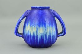 A RUSKIN POTTERY CRYSTALLINE VASE, having two applied handles, decorated with a matt blue over white
