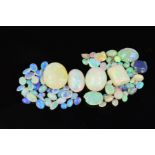 A LARGE COLLECTION OF ASSORTED OPALS, various cuts and sizes, total weight approximately 73.14ct