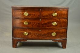 AN EARLY 19TH CENTURY MAHOGANY BOW FRONT CHEST OF TWO SHORT OVER TWO LONG GRADUATED DRAWERS,