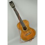 AN EARLY 19TH CENTURY PARLOUR GUITAR, c.1830, this small bodied ladies Parlour guitar hand