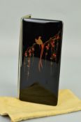 A JAPANESE TAISHO PERIOD CIGARETTE CASE, black lacquered and overlaid, the front with two exotic