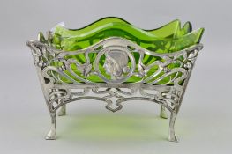 A WMF PEWTER CENTREPIECE, of rectangular form on raised feet, the sides pierced and cast with
