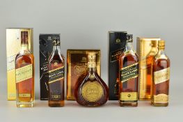 FIVE BOTTLES OF JOHNNIE WALKER BLENDED SCOTCH WHISKY, comprising a bottle of Gold Label Scotch