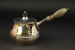 AN INDIAN COLONIAL SILVER BRANDY SAUCEPAN AND COVER, turned wooden finial and handle, hinged