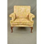 A GEORGE II STYLE WALNUT FRAMED LOVE SEAT, the rectangular back above outward scrolled arms, squab