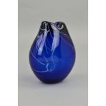 A WHITEFRIARS VASE BY GEOFFREY BAXTER, the cased royal blue body is decorated with random white