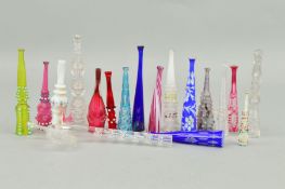 A COLLECTION OF EIGHTEEN VICTORIAN GLASS CHEROOT HOLDERS, clear and coloured, facet cut, enamelled