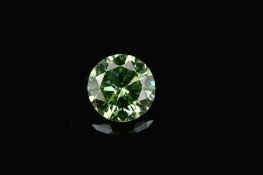 A GREEN MODERN ROUND BRILLIANT CUT DIAMOND, weighing 1.65ct, colour assessed as treated, clarity