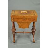 A VICTORIAN BURR WALNUT AND PARQUETRY BANDED FOLD OVER GAMES/SEWING TABLE, the top inlaid with a