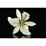 A NORWEGIAN ENAMEL BROOCH BY ASKEL HOLMSEN, designed as a white guilloche enamel lily, with maker'