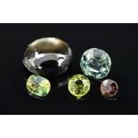 A SELECTION OF SAPPHIRES, to include a pale green round mixed cut, measuring approximately 7.1mm